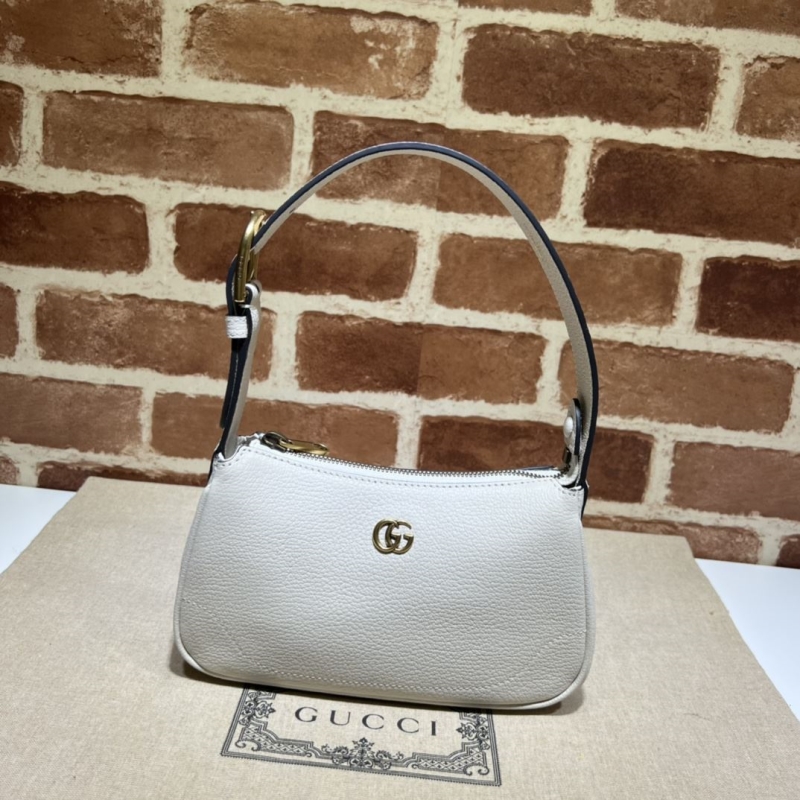 G*u*i top handle bags